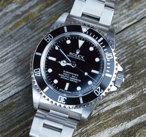 rolex submariner 14060m 2002|Rolex Submariner 14060 price.